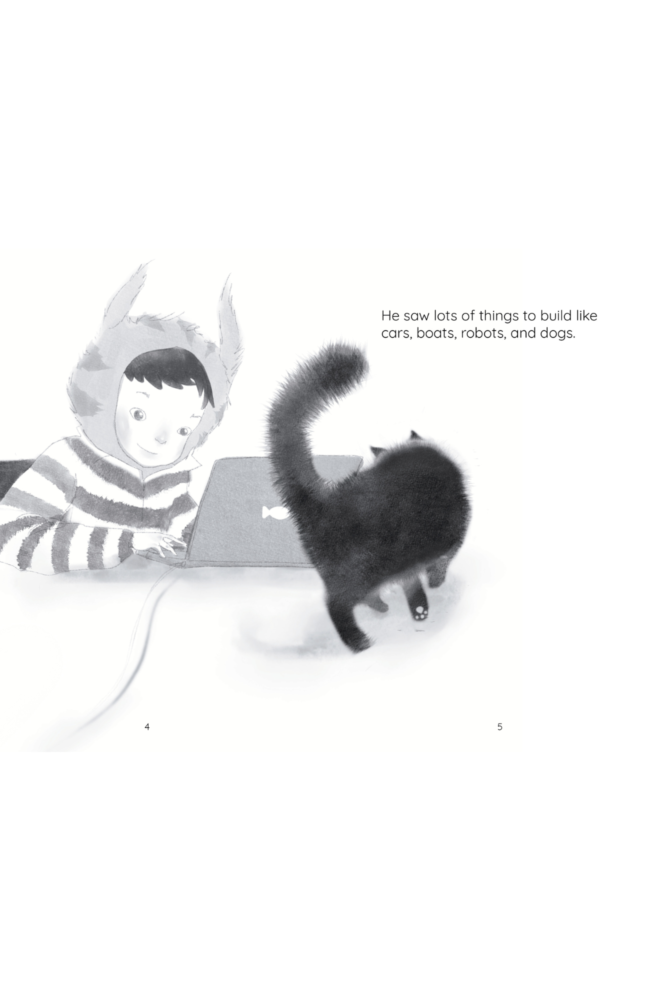 Boy on computer with black cat