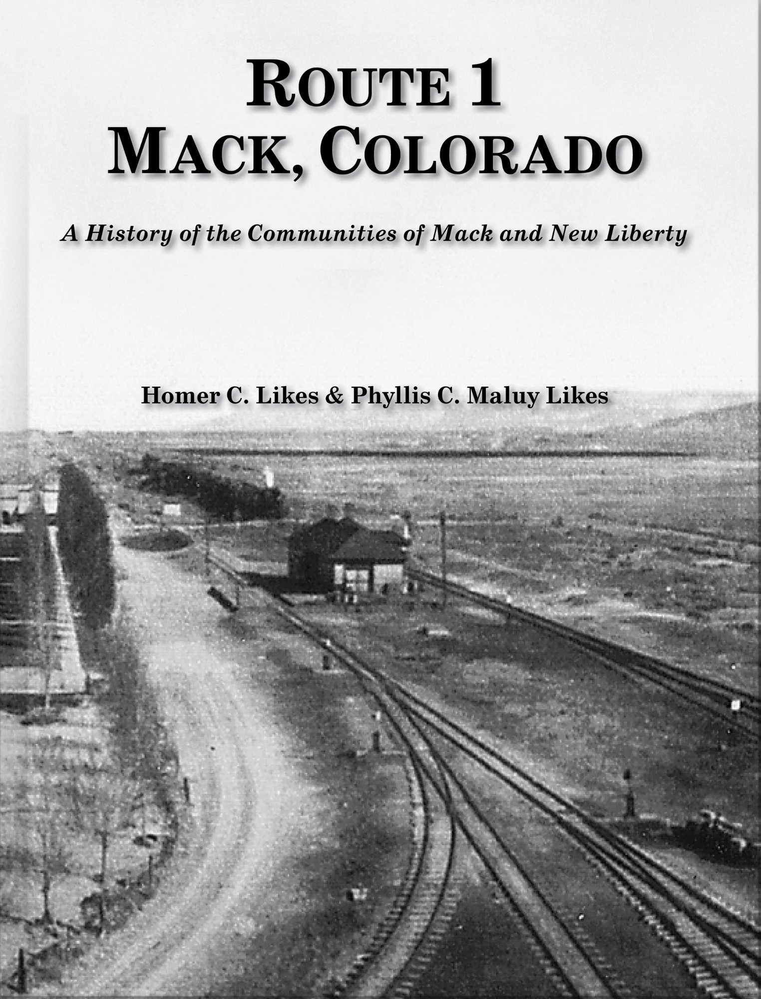 Book cover of 'Route 1 Mack, Colorado' with a black and white photograph of a rural area with tracks and a house.