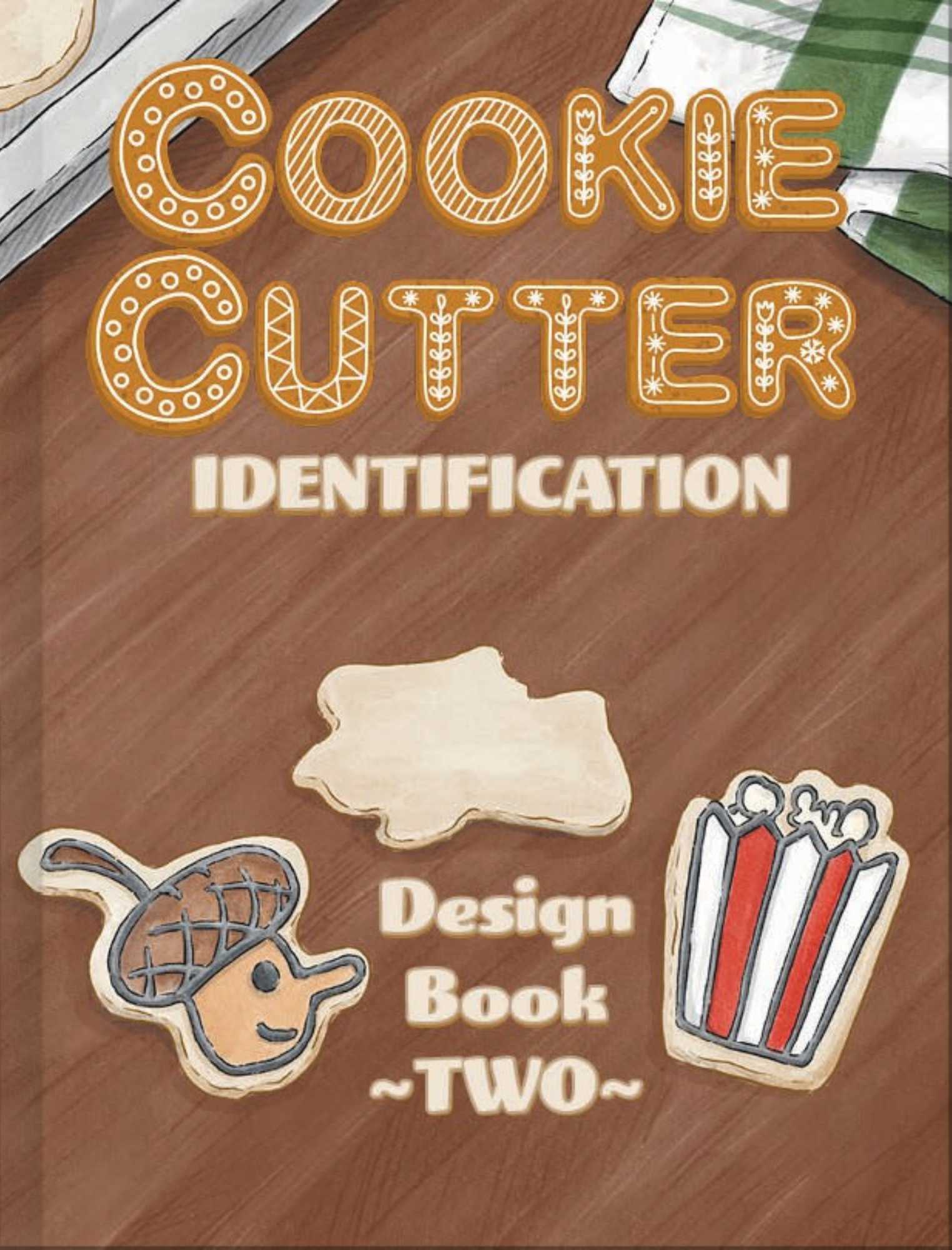 Book cover of 'Cookie Cutter Identification Design Book Two' with cookie cutters on a wooden background