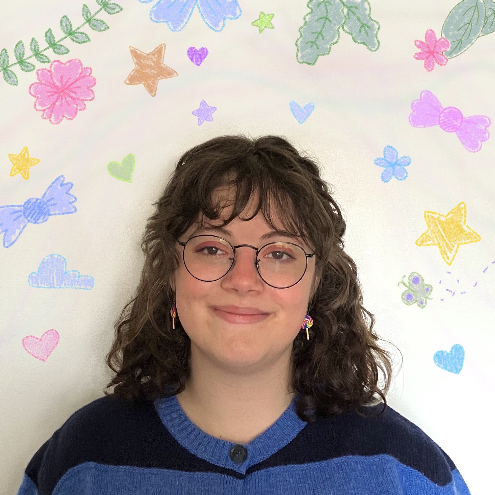 Person wearing glasses with a colorful, patterned background